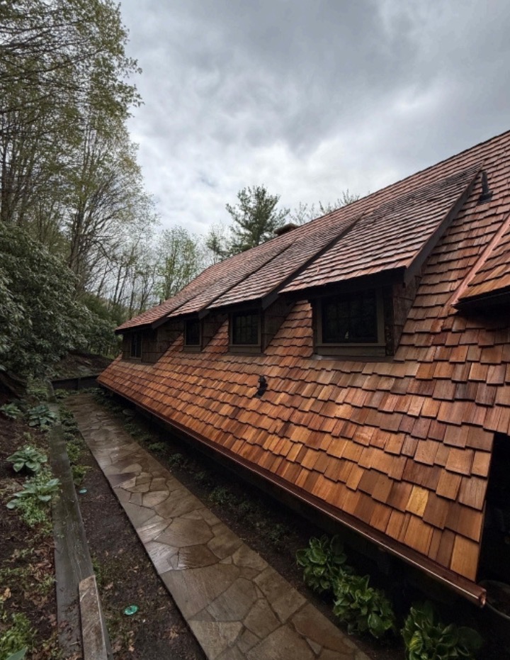 Seamless aluminum gutter installation on a High Country home
