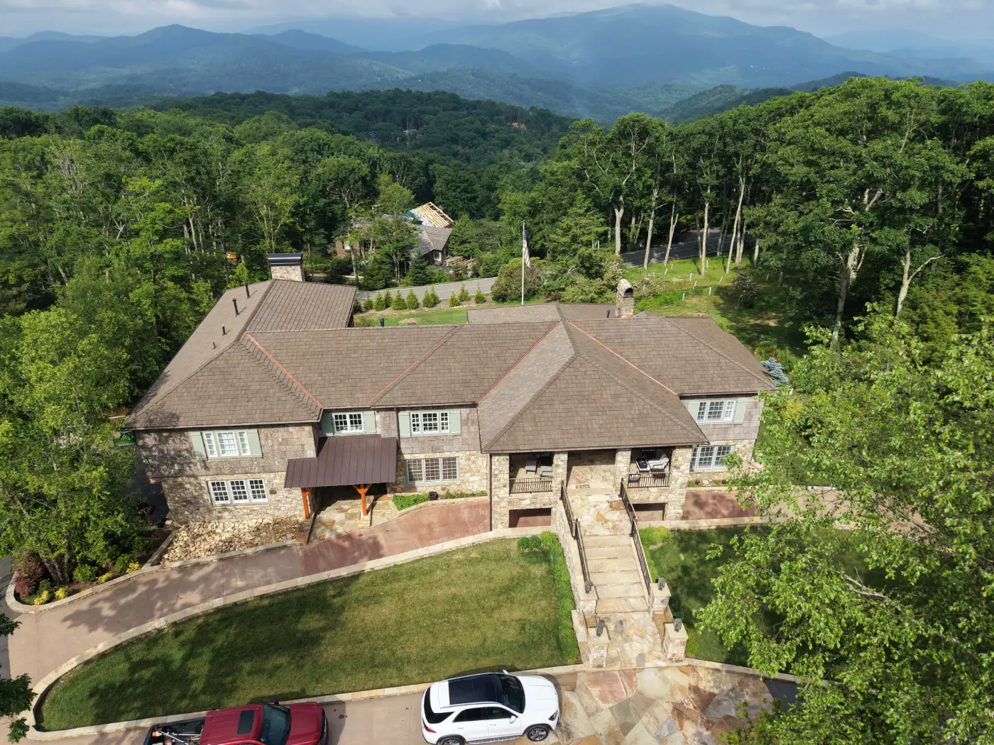 New roof on a stone mountain home with Blue Ridge views in the NC High Country